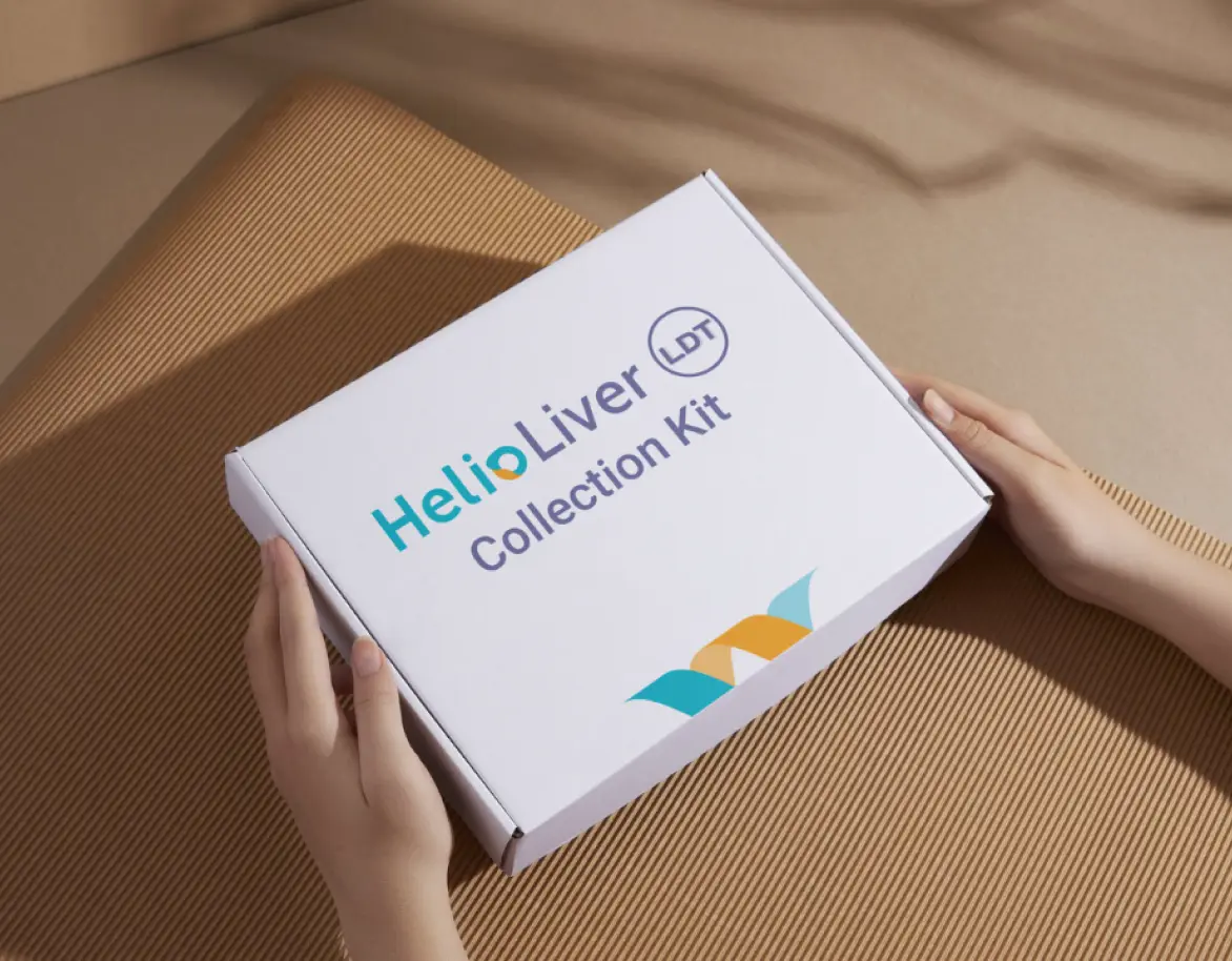 HelioLiver LDT Collection Kit held in two hands