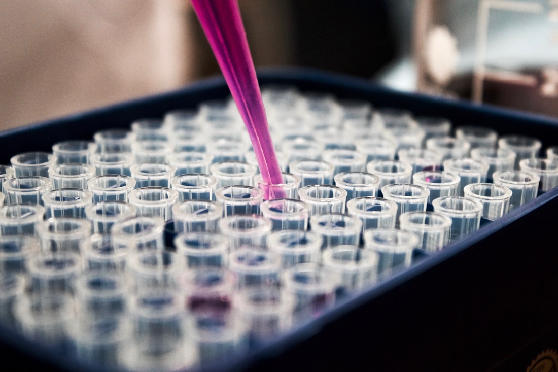 Laboratory scientist processing patient blood samples for cfDNA analysis