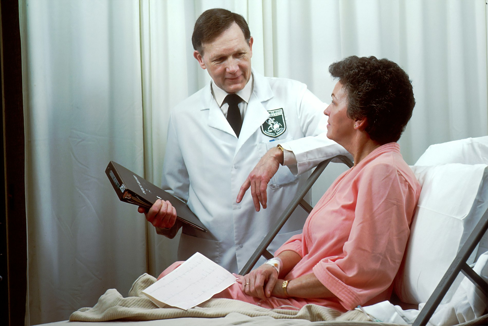 Doctor discussing test results with a patient during a consultation